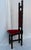 A striking late 19th-century Victorian Jacobean Revival high-back chair, showcasing an exceptionally elaborate bobbin-...