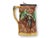 A charming late 19th century English majolica syrup pitcher modeled as a tree trunk with applied grape clusters and vine...