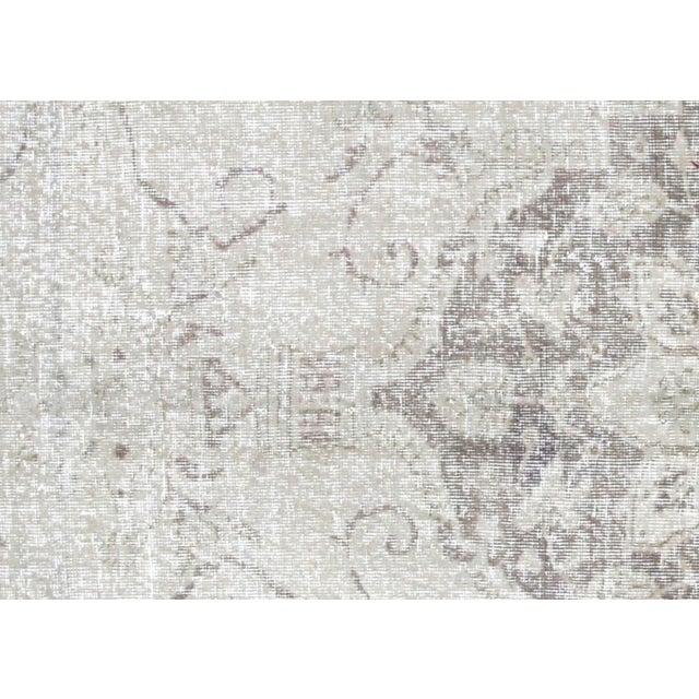 Vintage Turkish Oushak Rug (6'9" x 10'2") handcrafted with wool on wool foundation in Western Turkey's Oushak region. From...