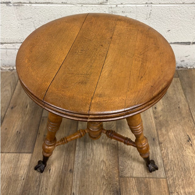 This is such a cool antique Victorian claw foot glass ball piano stool, likely from the early 1900s. Wood appears to be...
