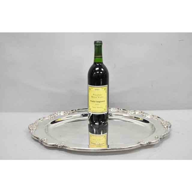 Vintage 1847 Rogers Bros "Remembrance" Oval Silver Plated Serving Platter Tray. Circa Mid 20th Century. Measurements: 1" H...