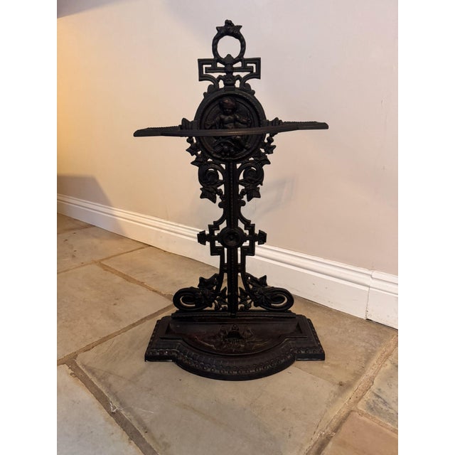 Fantastic quality antique Victorian cast iron umbrella stand, having a quality antique Victorian umbrella stand decorated...