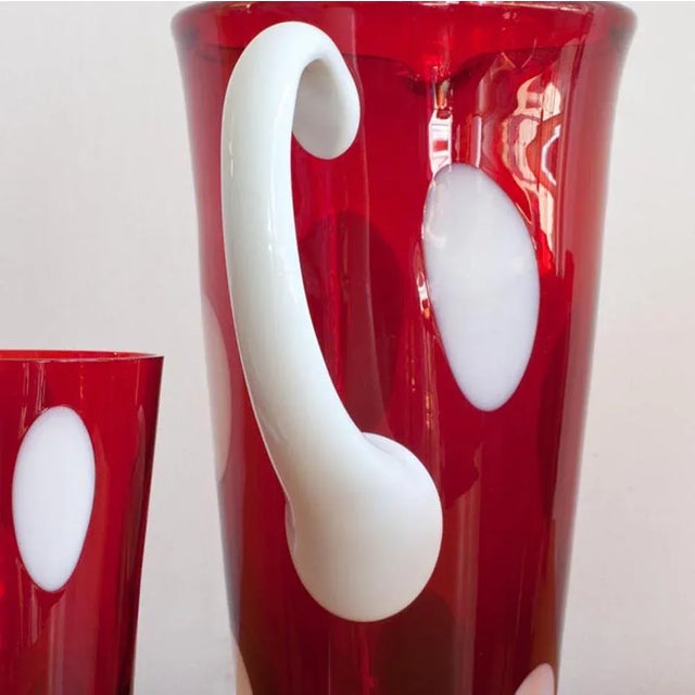 This mouth-blown carafe with 12 glasses was designed and produced by Nason & Moretti in Murano, Italy Glass dimensions: -...