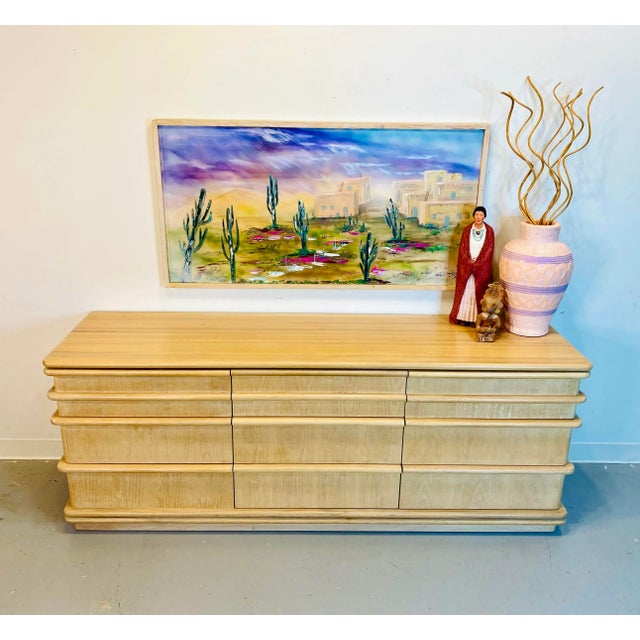 The colors in this painting are bold and would be a great addition to any home.