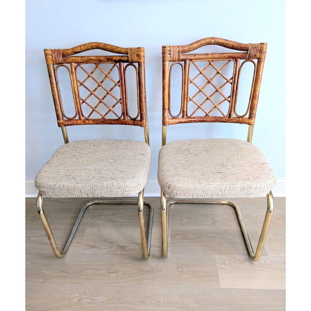 This is a great pair of vintage bamboo, rattan & metal cantilever dining chairs by Cramco out of Philadelpha, PA (see tag...