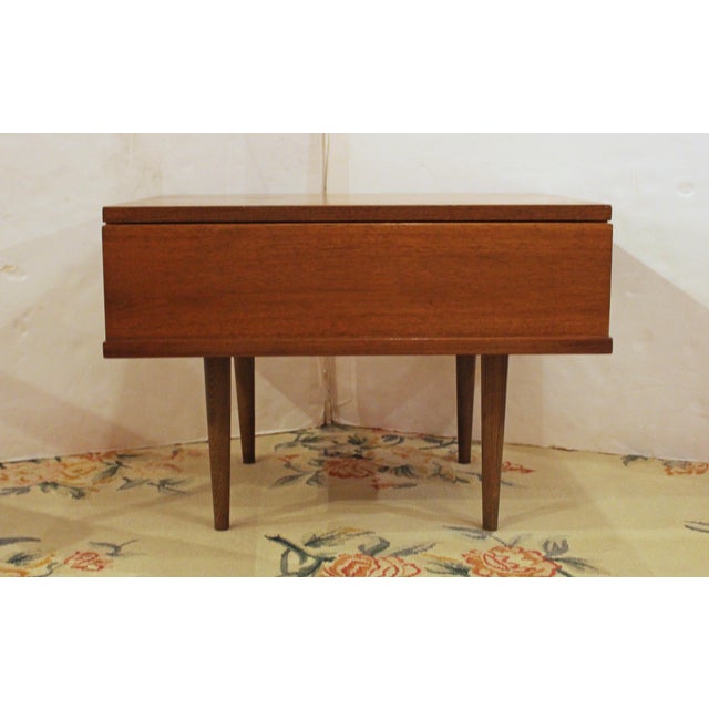 A 1962 Mel Smilow designed side table, Smilow-Thielle Collection, USA. Side table with drawer of walnut veneers on oak...
