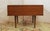 A 1962 Mel Smilow designed side table, Smilow-Thielle Collection, USA. Side table with drawer of walnut veneers on oak...