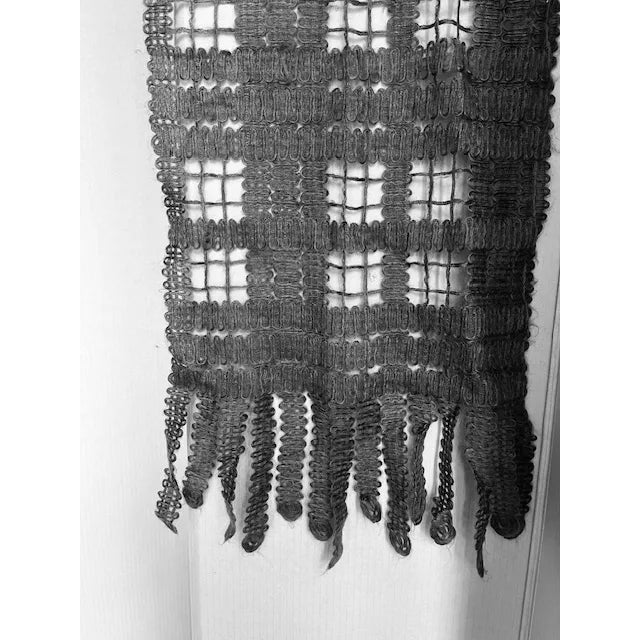 A beautifully soft and lightweight wrap scarf from Burberry, crafted in Italy from a plush mohair blend. The subtle...