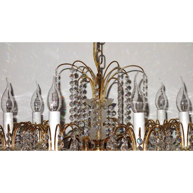 Brass Lead Crystal 24k Gold Plated Seven Light Chandelier from Sölken Leuchten, 1970s, in Very Good conditions. Designed...