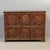 Painted antique Tibetan cabinet with decorated panels, four of which are doors. Each hand painted panel uses the kyung bur...