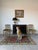 An elegant pair of antique Italian faux bamboo accent chairs featuring beautifully detailed gilt wood frames with classic...