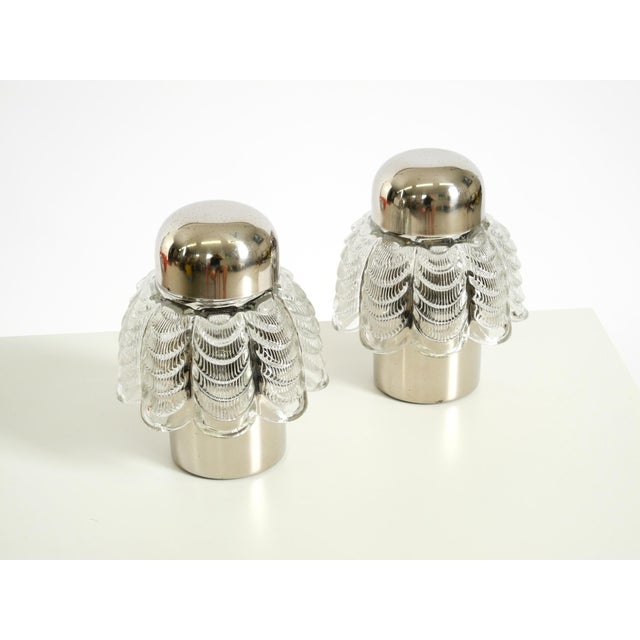 One pair of large, rare 1960s table lamps made of metal and glass. manufacturer: veb narva leuchtenbau lengefeld. the...