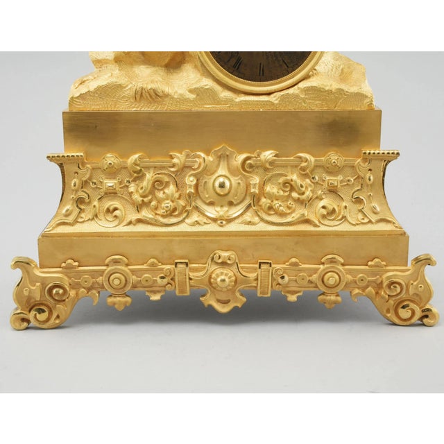 Impressive mantel clock with a horse hussar above the dial. Fine metalwork and coordinated coloring represents the horse...