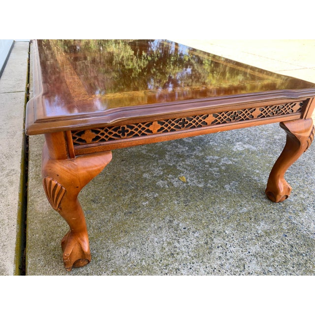 Upscale traditional coffee table, solid wood with cherry veneer finish. Rich detailed wood grain design on table top with...