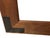 Handsome wall mirror featuring a wide wood frame with decorative black iron corner brackets. A versatile statement piece,...