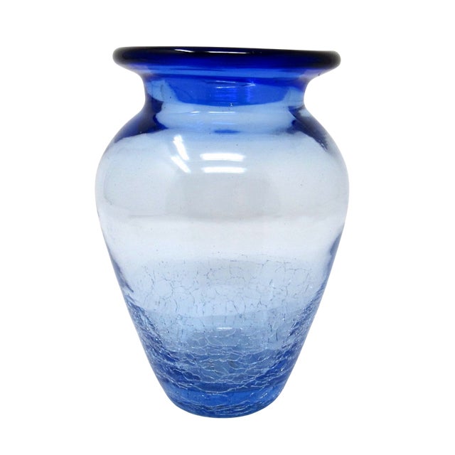 A vintage small Blenko cobalt blue crackle glass flower vase. Likely made in the 1960s. The glass is thick and crackled on...