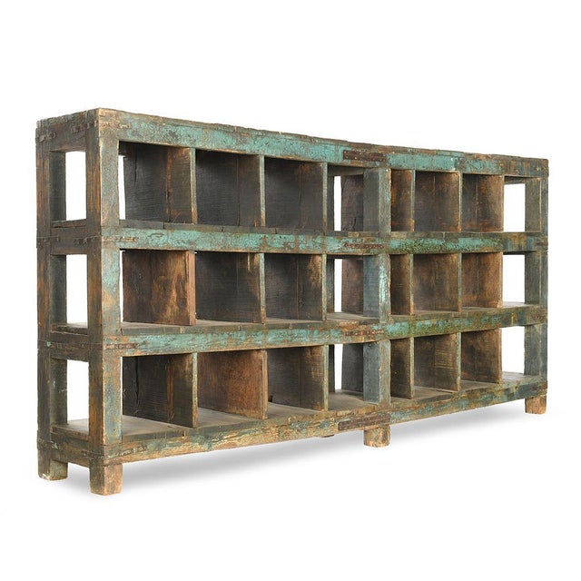 Shelves weathered wood workshop in 24 cases. Furniture vintage old weathered teak. Has 24 wooden shelves. The old teak...