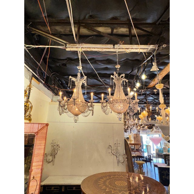 This product is a pair of Italian beaded crystal basket chandeliers, perfect for adding a touch of elegance and...