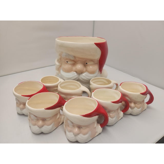 It's rare to find a complete set of this Vintage Side-eye Santa Ceramic Punch Bowl & set of 8 Santa mugs. Perfect to add...