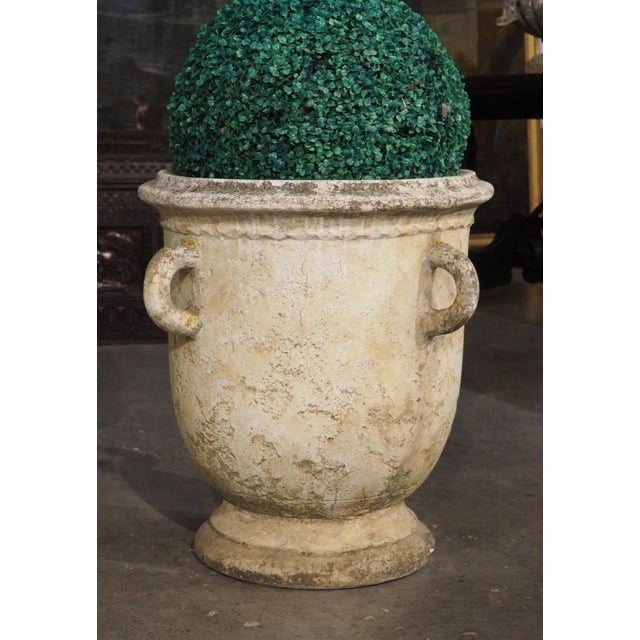 More information coming soon… This pair of French planters from about the 1970s has four large looped handles on each...