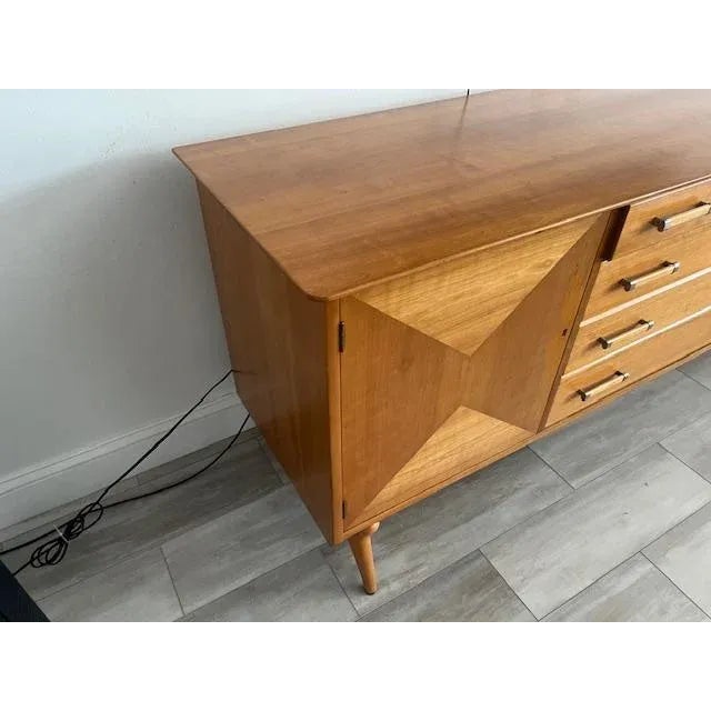 The 1960s Renzo Rutili sideboard credenza by Johnson Furniture Company USA is a beautiful piece of vintage furniture. This...