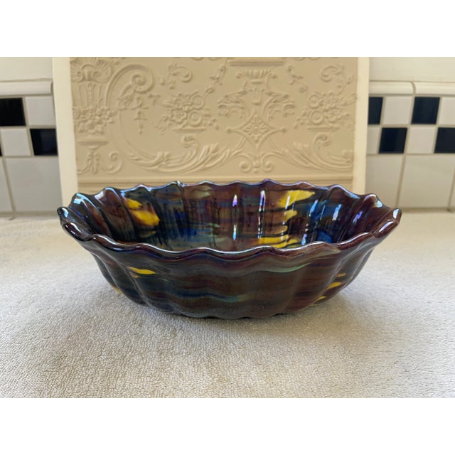 Rare and Vintage 1940s Slipware Art Pottery, large oval ridged bowl and highly collectible. It is in good shape since it...