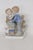 This adorable Boy and Girl Figurine is made out porcelain. This lovely decorative piece is titled "Young Love", presenting...