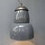 Large industrial blue-grey enamel pendant lamp from the 1940s in Bauhaus style. The fixture of the lamp is cast iron with...