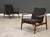 A pair of sleek mid century modern teak model 138 easy lounge chairs with charcoal grey fabric newly reupholstered...