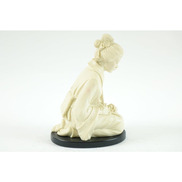 Japanese Sculpture of Woman - 3” x 2.5” x 10” This elegant Japanese sculpture depicts a woman in traditional attire,...