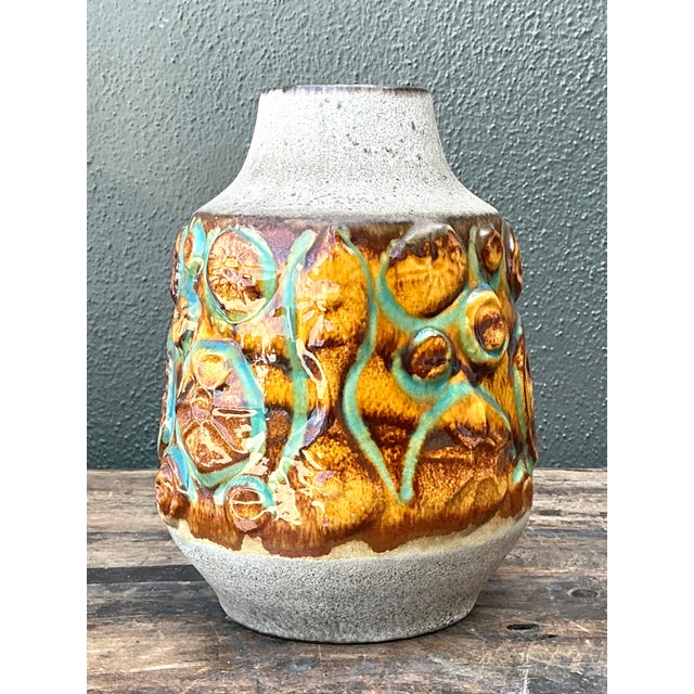 This exceptional original West German art pottery vase is a masterclass in Mid-Century Modern design, embodying the...