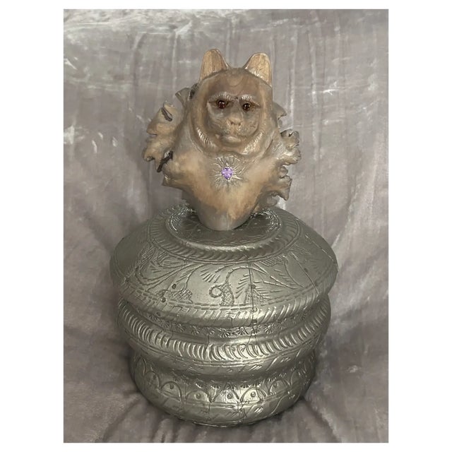 The carved wood lion, I attached to the rare silver and Indian antique wood box. The lion was hand carved in Parasite...