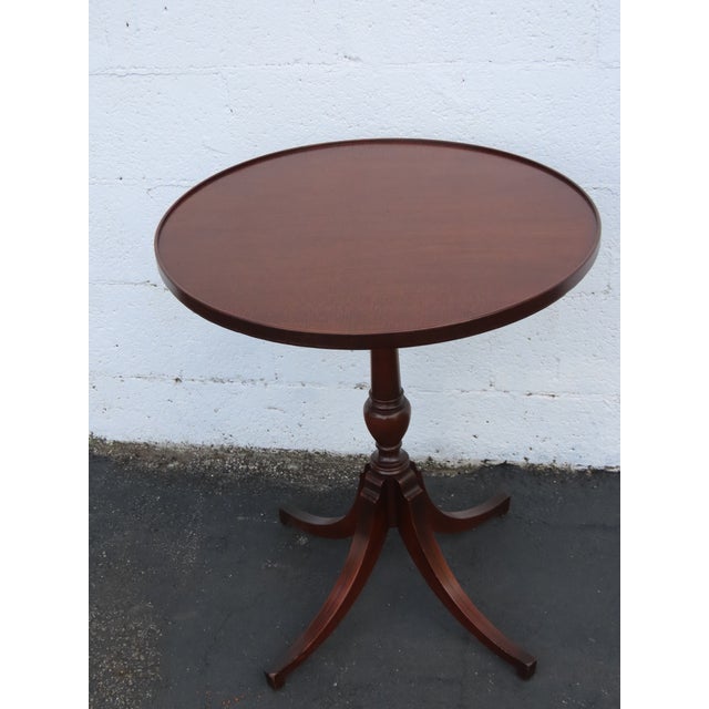 This beautiful Side Table is made of wood, mahogany, and veneer. It was made by Imperial Furniture Company of Grand...