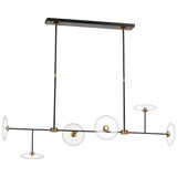 Ian K. Fowler for Visual Comfort Signature Calvino Large Linear Chandelier in Aged Iron & Hand-Rubbed Antique Brass with Clear Glass For Sale