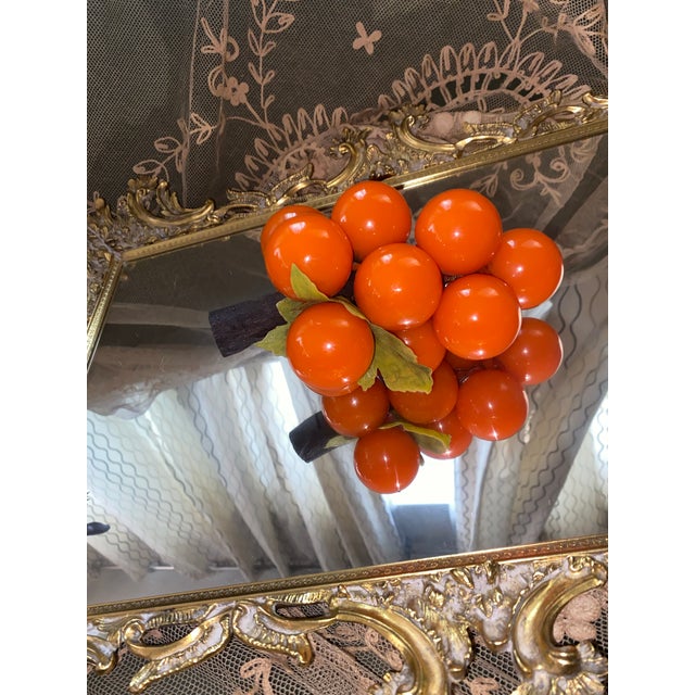 Mid Century Modern Opaque Orange Lucite Grapes. Rare color The stem is not wood , leaves are plastic Lucite, a brand name...