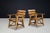 A remarkable pair of sculptural solid oak armchairs, handcrafted in France during the 1950s. These highly expressive...