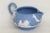 This lovely Creamer is made out of porcelain. This creamer is stamped as being made by Wedgwood in England in 1957, see...