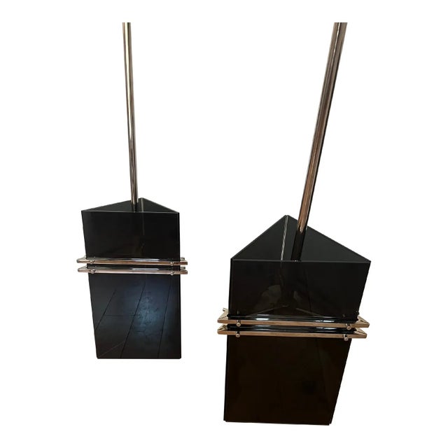 Pair of 1920s Hungarian Art Deco pendant lights in triangular smoked glass with nickel plated chrome fittings. Reclaimed...