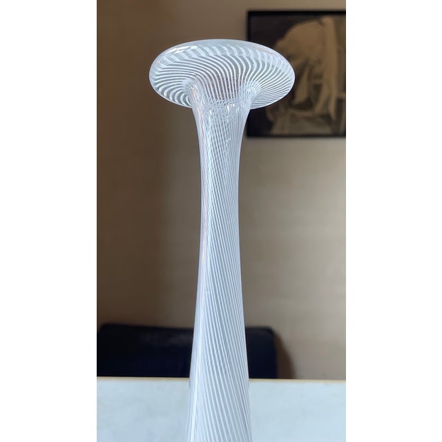 A tall, lean, footed and hand-blown white/clear swirl glass vase similar to designs from Tapio Wirkkala and Dino Martens...