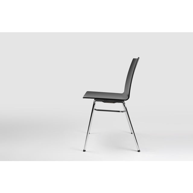 Belgium / 2000 / chair / wood, metal / Mid-century / Design A sleek designed multi-functional design chair with wooden...