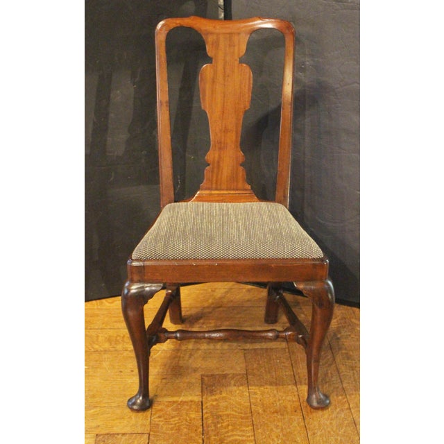 Pair of early-mid 18th century Queen Anne side chairs, English. Made of padouk wood. Nicely shaped back splats. Raised on...