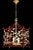 Casa- Wrought iron hexagonal open lantern with panels consisting of crystal and metal leaves. Many colors available.
