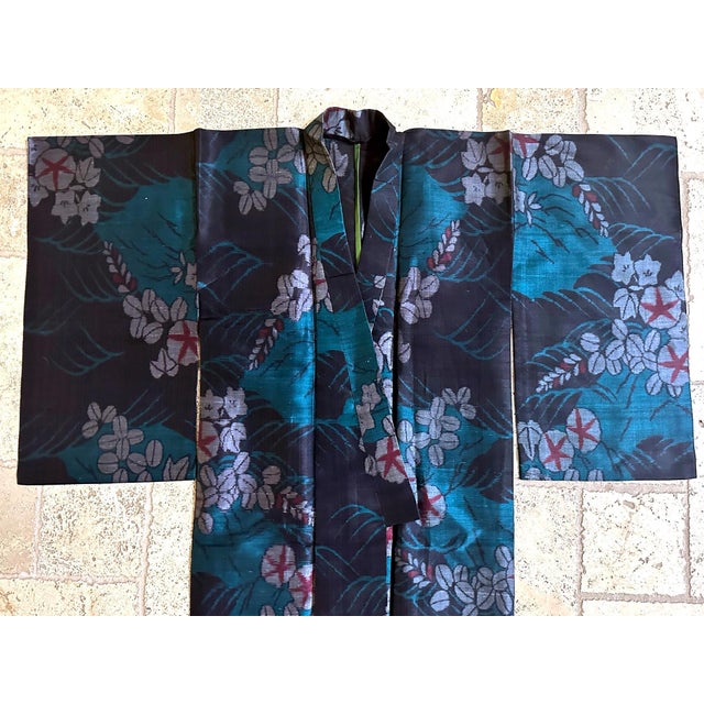 A super fine Japanese summer unlined (Hitoe) Kimono made with a soft Asa fiber blended with silk. The garment was hand-...