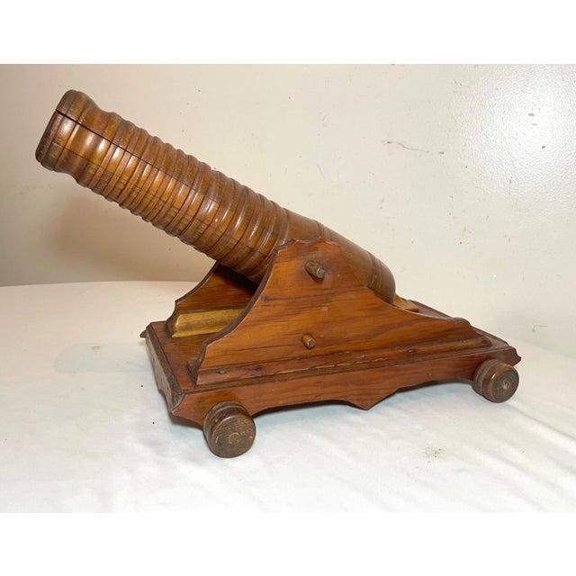 Up for sale is a rare antique handmade Folk Art model cannon sculpture. It's beautifully carved with intricate stylized...