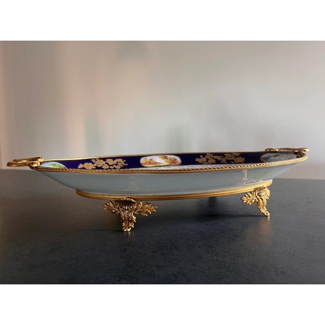 Ceramic / hand-decorated table stand signed on the back French Louis XV with brass details such as stand and handles...