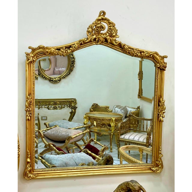 Elevate your home décor with this French style vintage gold leaf mirror, a stunning piece that blends Baroque and Rococo...