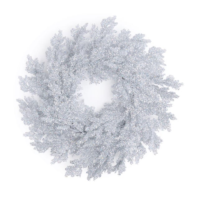 Add brilliant sparkle to your holiday décor with this Silver Glitter Snowflake Wreath. Designed with intricately shaped...