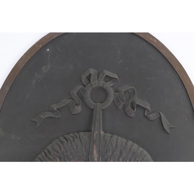 Vintage logo relief from The Brooks Brothers on 5th Ave. The motif is classic; it originated in the medieval period as the...