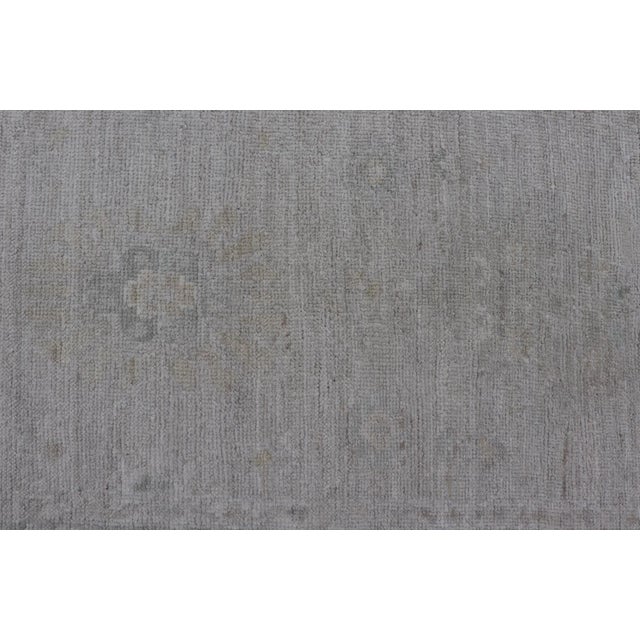 Hand-Knotted Oushak Runner With Medallion Design on a Cream Field With Blues For Sale - Image 10 of 12