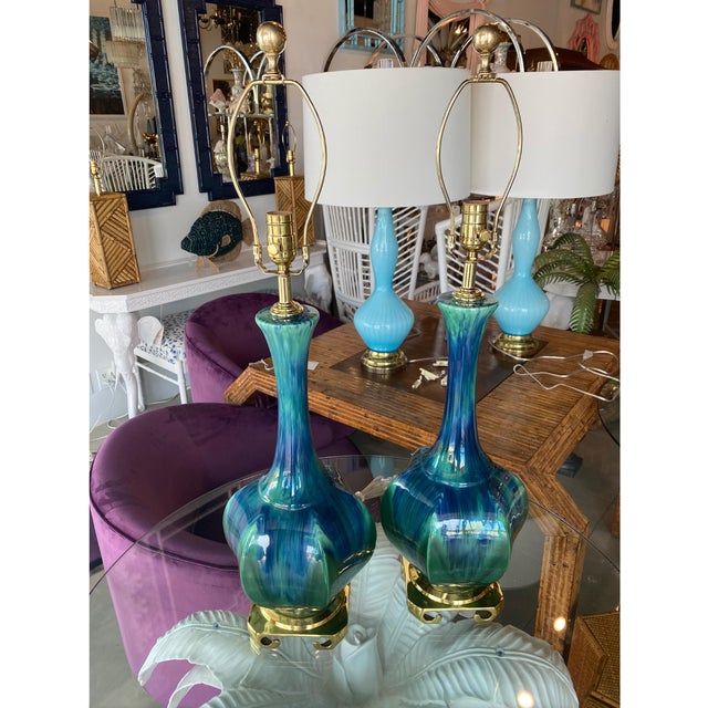 Stunning vintage pair of blue and green ceramic lamps with amazing color variations. These have been meticulously restored...